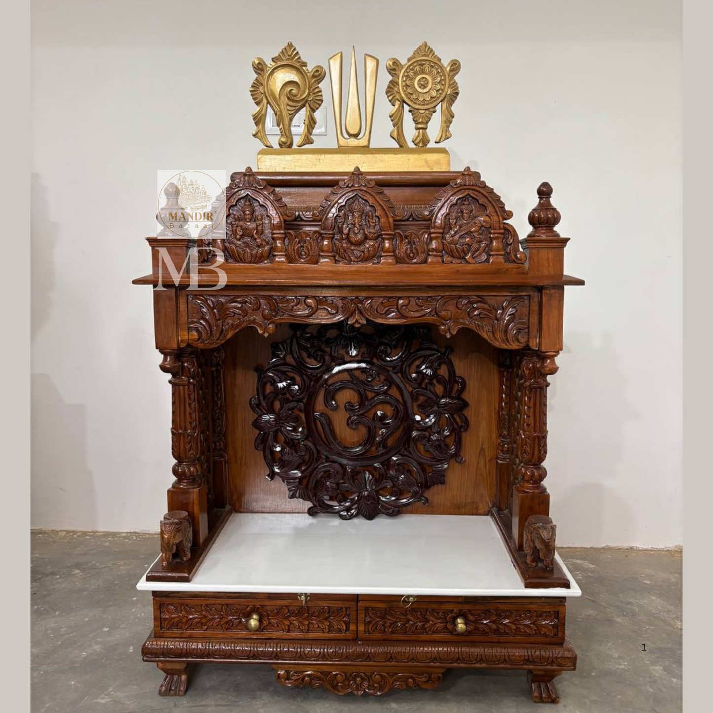 Handcrafted wooden pooja mandir for home with traditional carvings and Om design