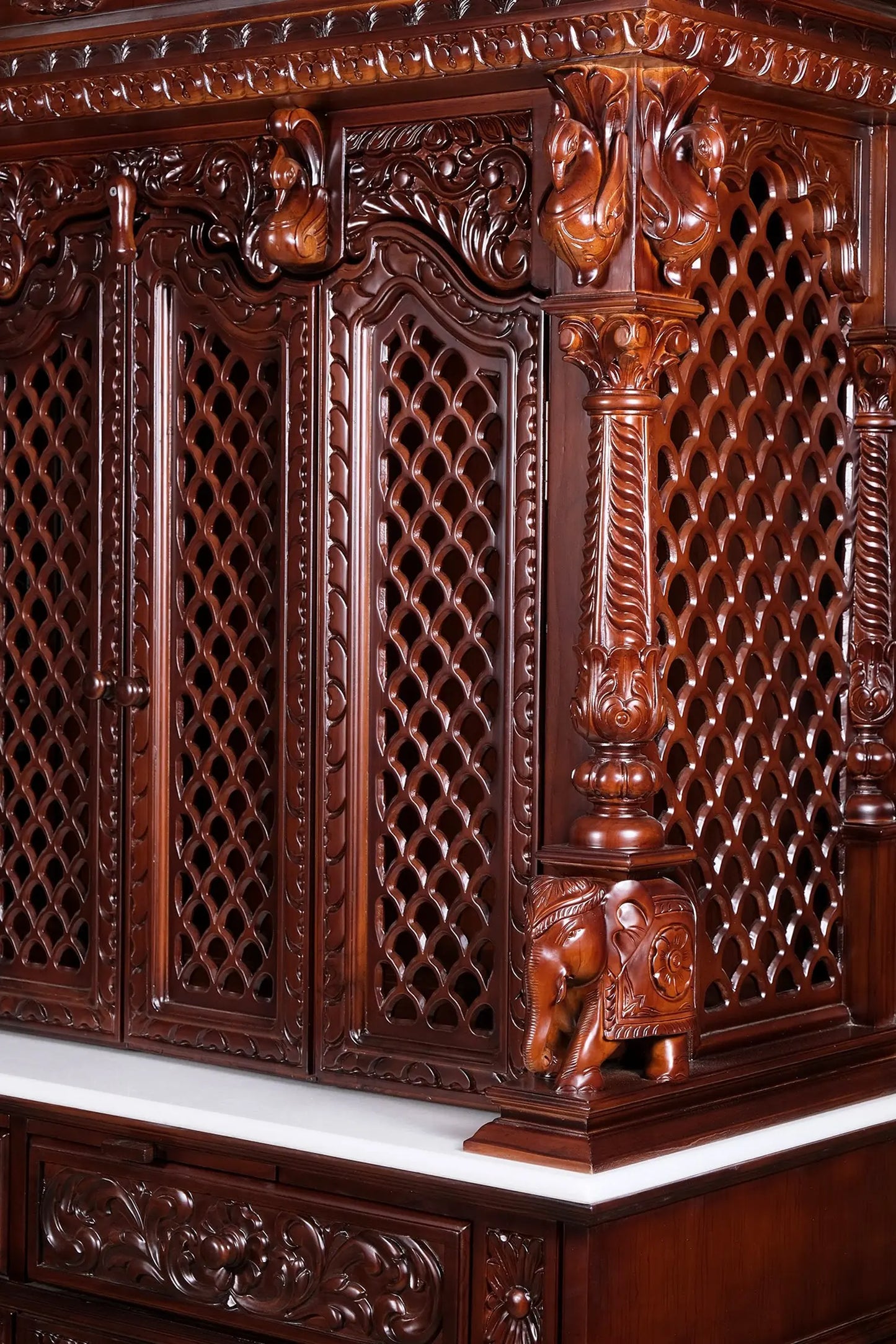 Traditional wooden pooja mandir with altar platform