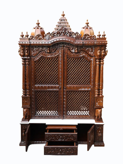 Handcrafted wooden home mandir with traditional Hindu temple design