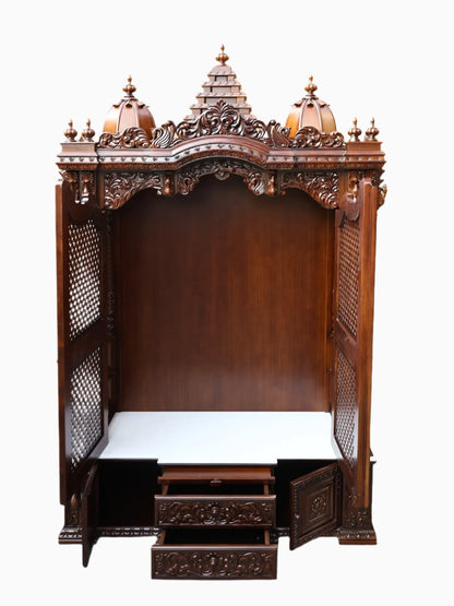 Handcrafted wooden home mandir with traditional Hindu temple design