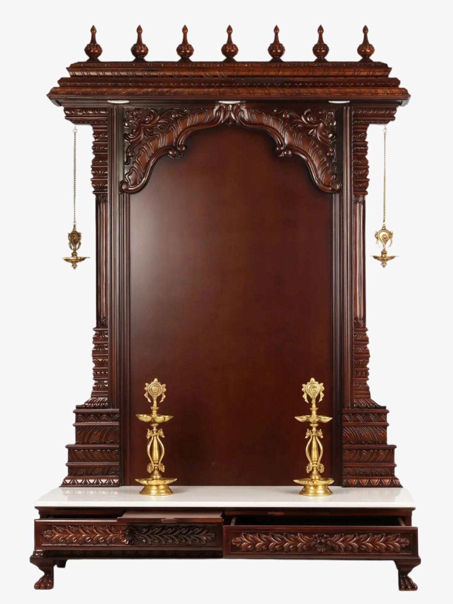 luxury teakwood wooden mandir with brass lamps and marble detailing