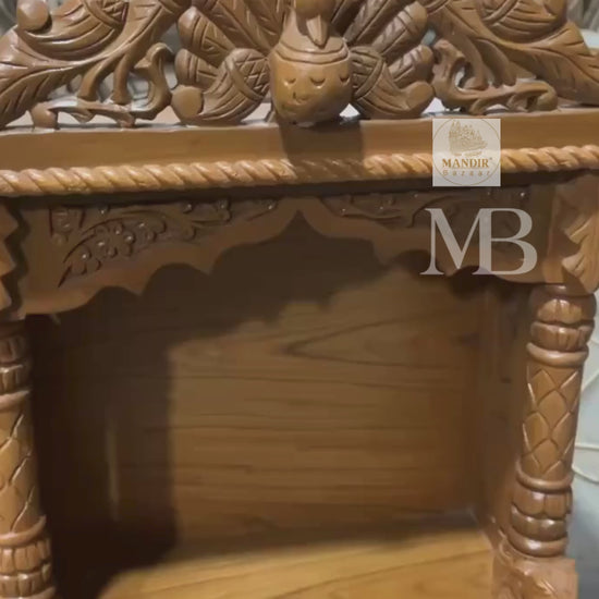 handcrafted Sheesham wood open temple with dancing peacock crest and carved drawer
