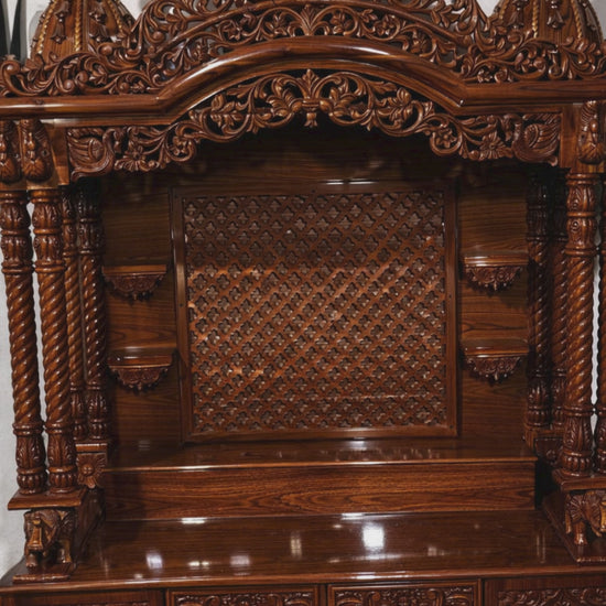 Luxury Sheesham wood pooja mandir with walnut brown high gloss finish, hand carving and multiple storage drawers