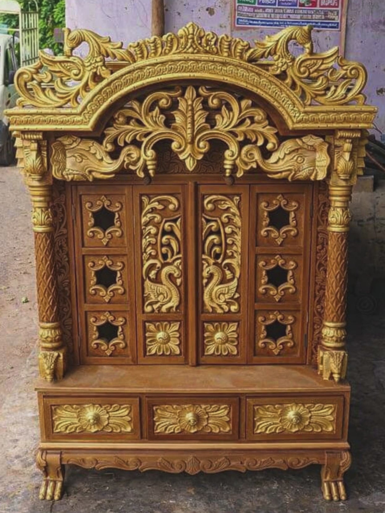3 feet tall Sheesham wood home temple with arched peacock shikhara and closed folding doors