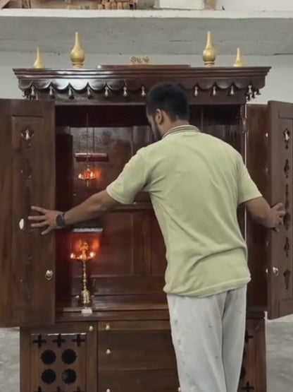 Handcrafted teak wood pooja mandir with storage cabinet, drawers, shelves and traditional brass bells