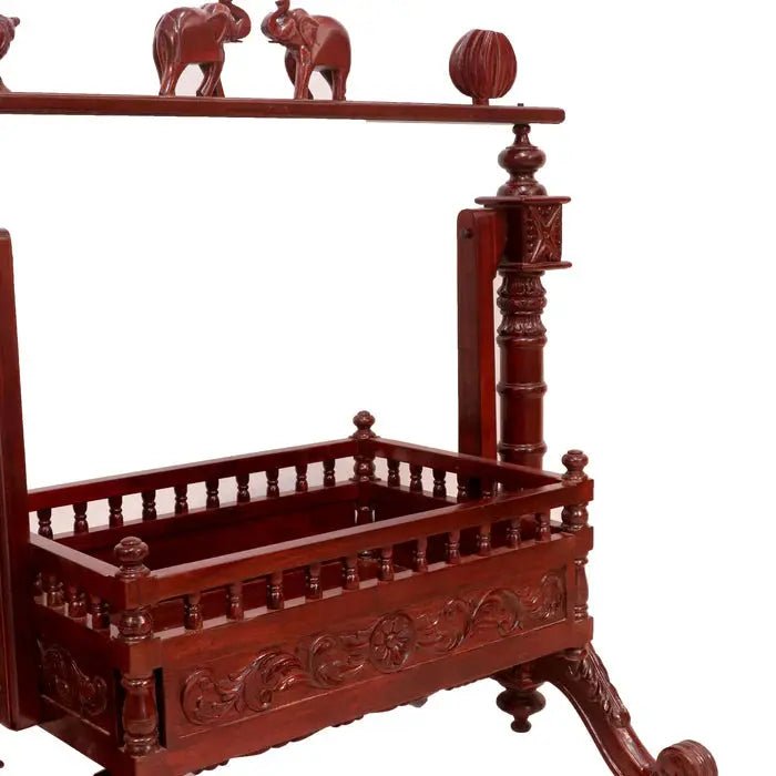 Teak wood baby cradle with spacious inner resting area