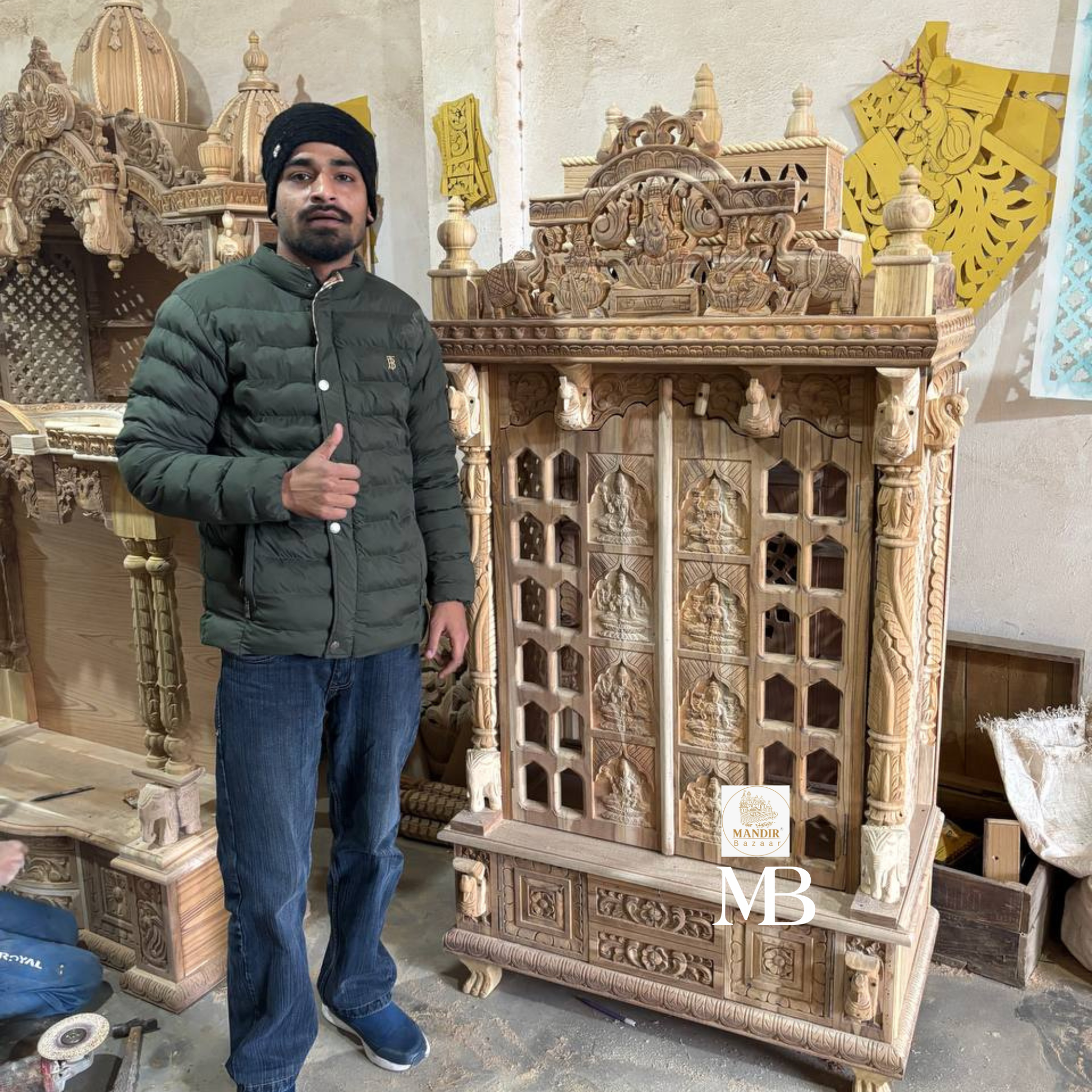 Feature callout graphic highlighting genuine brass bells, gold Ashtalakshmi carvings, and carved Om panel