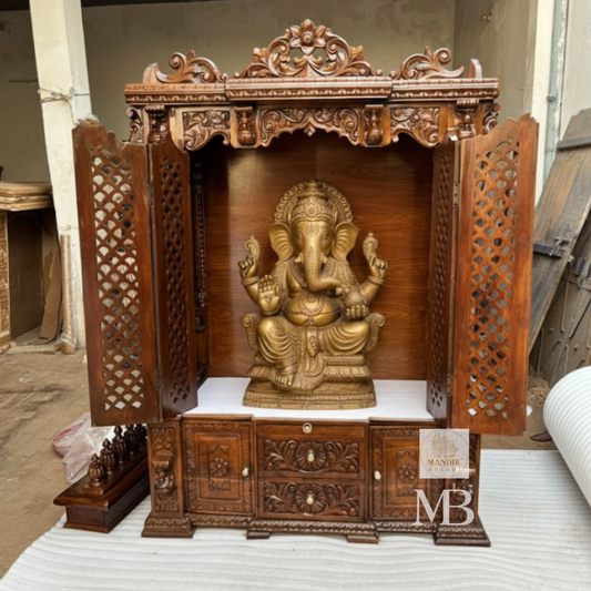 6 feet tall handcrafted solid Sheesham wood home temple with closed folding jali doors and storage cabinet