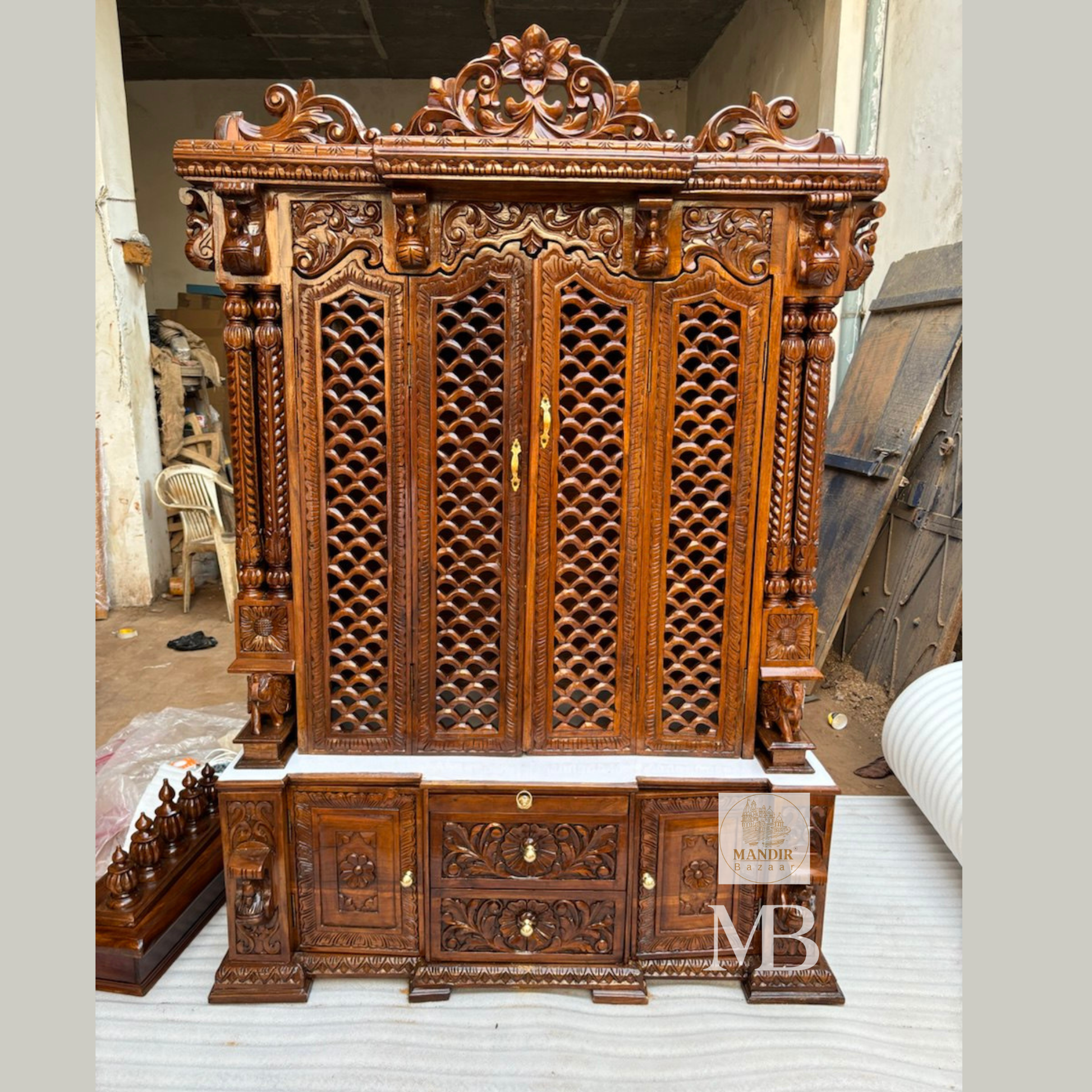 6 feet tall handcrafted solid Sheesham wood home temple with closed folding jali doors and storage cabinet