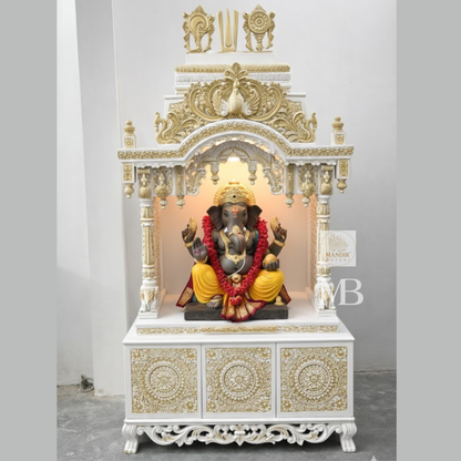 6 feet Sheesham wood pooja mandir in white and gold with hand carved details and storage drawers