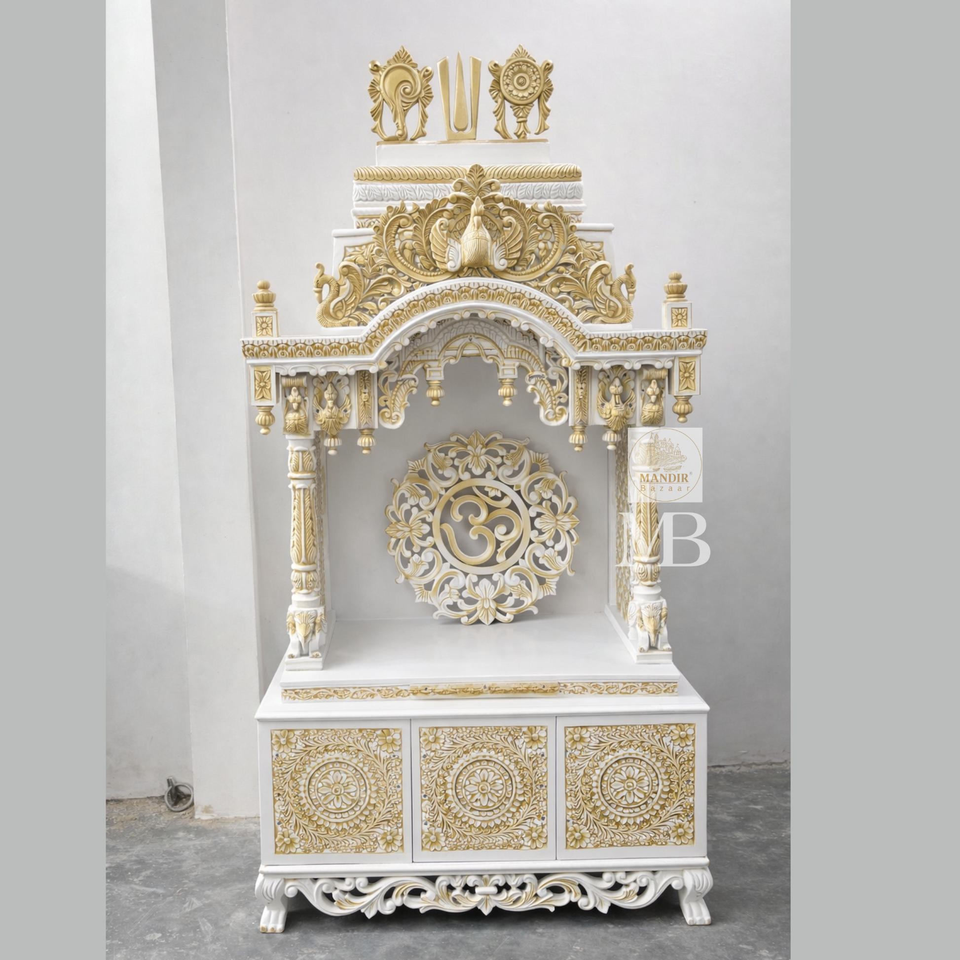 6 feet Sheesham wood pooja mandir in white and gold with hand carved details and storage drawers