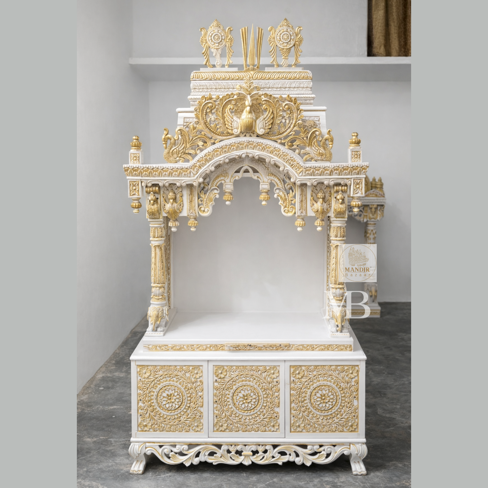 6 feet Sheesham wood pooja mandir in white and gold with hand carved details and storage drawers