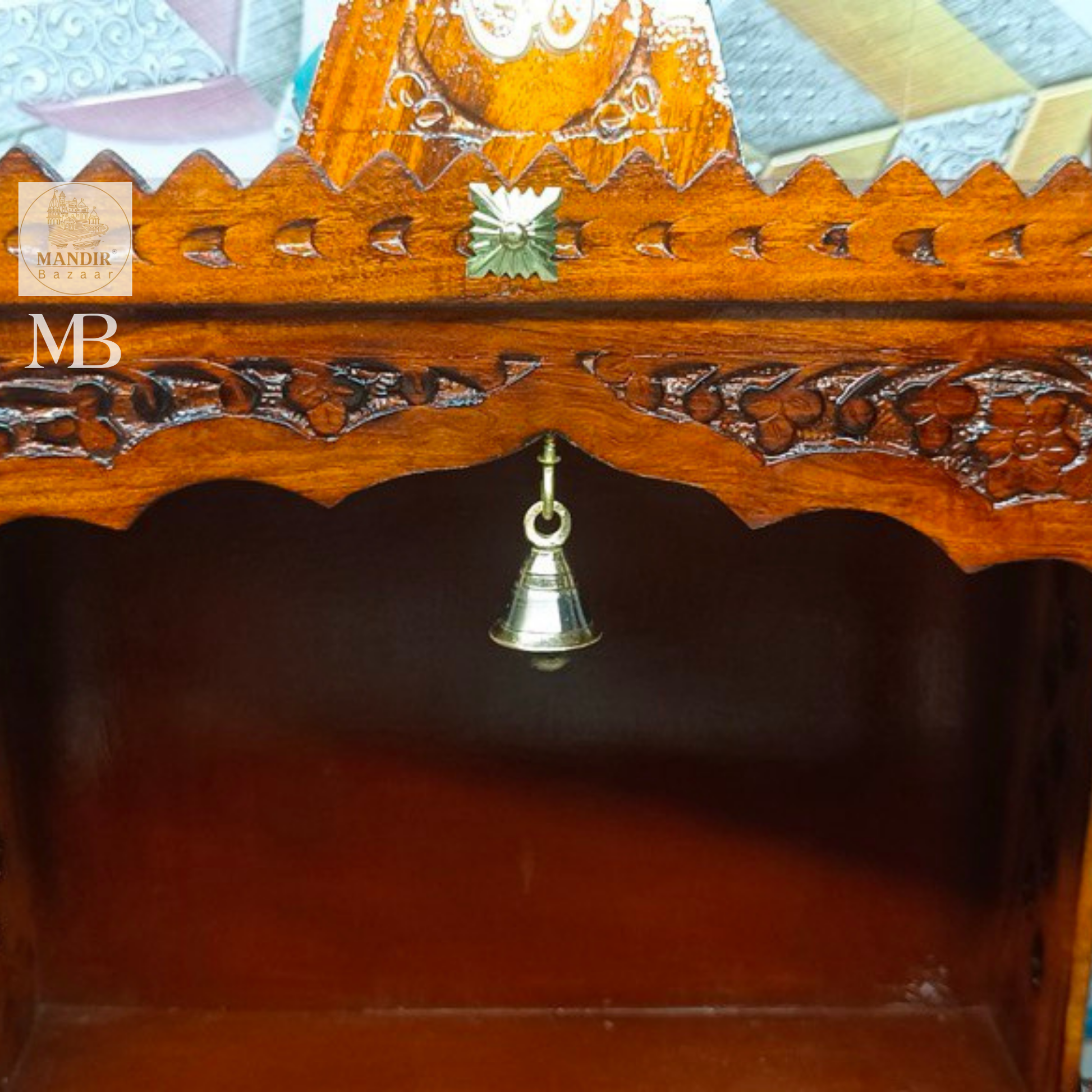 Front view of 21 inch handcrafted Sheesham wood home temple with pyramid shikhar, Om symbol, and hanging brass bell
