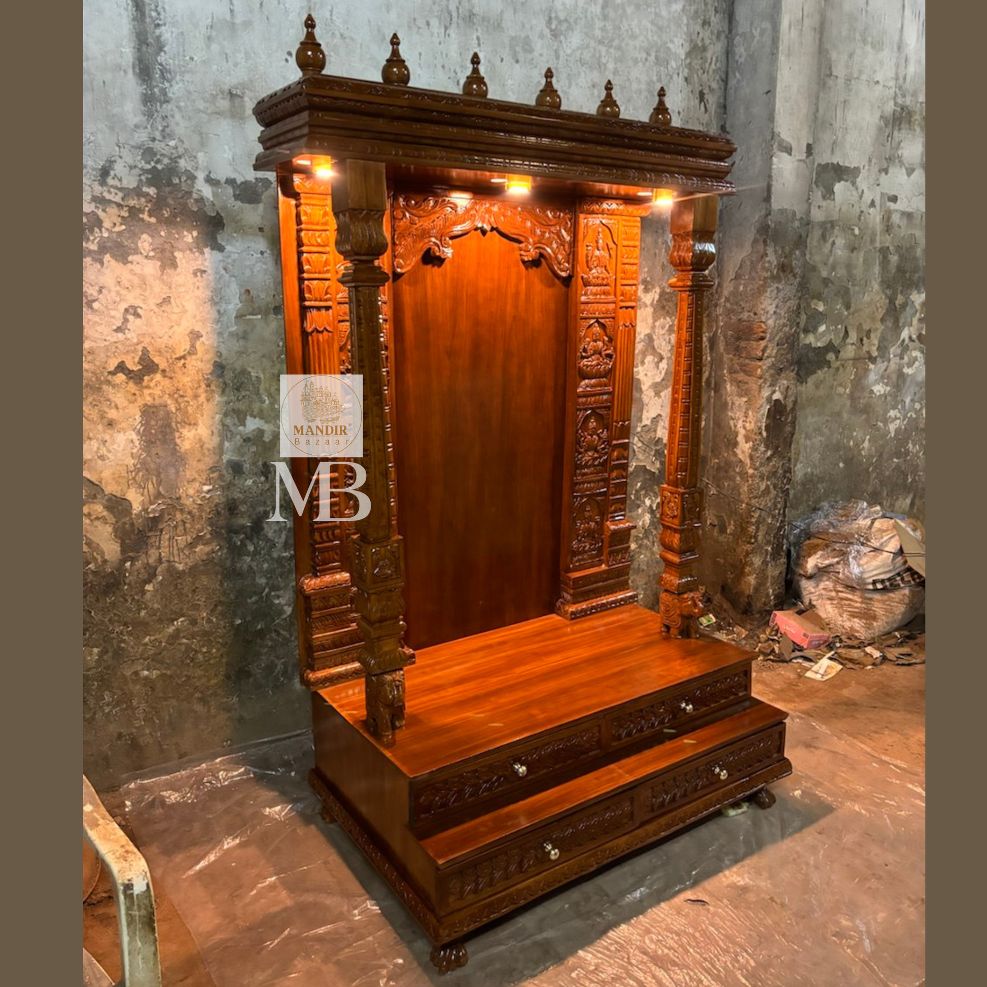 Side perspective angle of 6ft Sheesham wood temple highlighting 24 inch depth and elephant pillar bases