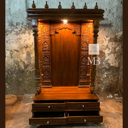 Front view of natural walnut finished Sheesham wood pooja mandir showing open stepped base drawers