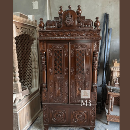6 feet tall dark walnut Sheesham wood home temple with closed carved doors and Ganesha crown
