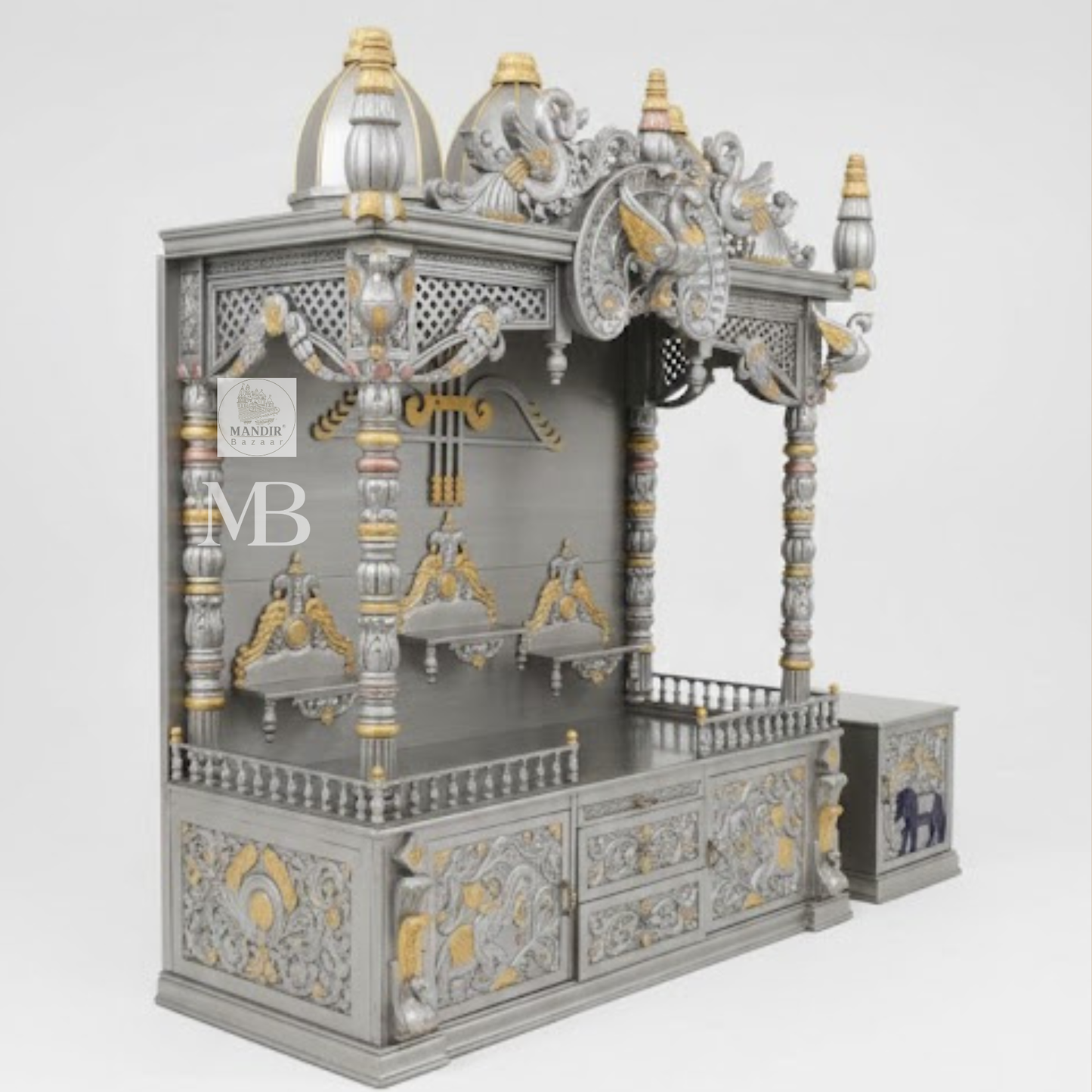 Luxury silver and gold hand carved wooden pooja mandir with ornate crown, decorative pillars, storage drawers and matching side cabinets