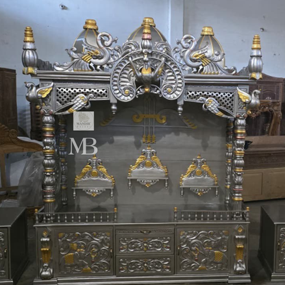 Luxury silver and gold hand carved wooden pooja mandir with ornate crown, decorative pillars, storage drawers and matching side cabinets