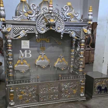Luxury silver and gold hand carved wooden pooja mandir with ornate crown, decorative pillars, storage drawers and matching side cabinets