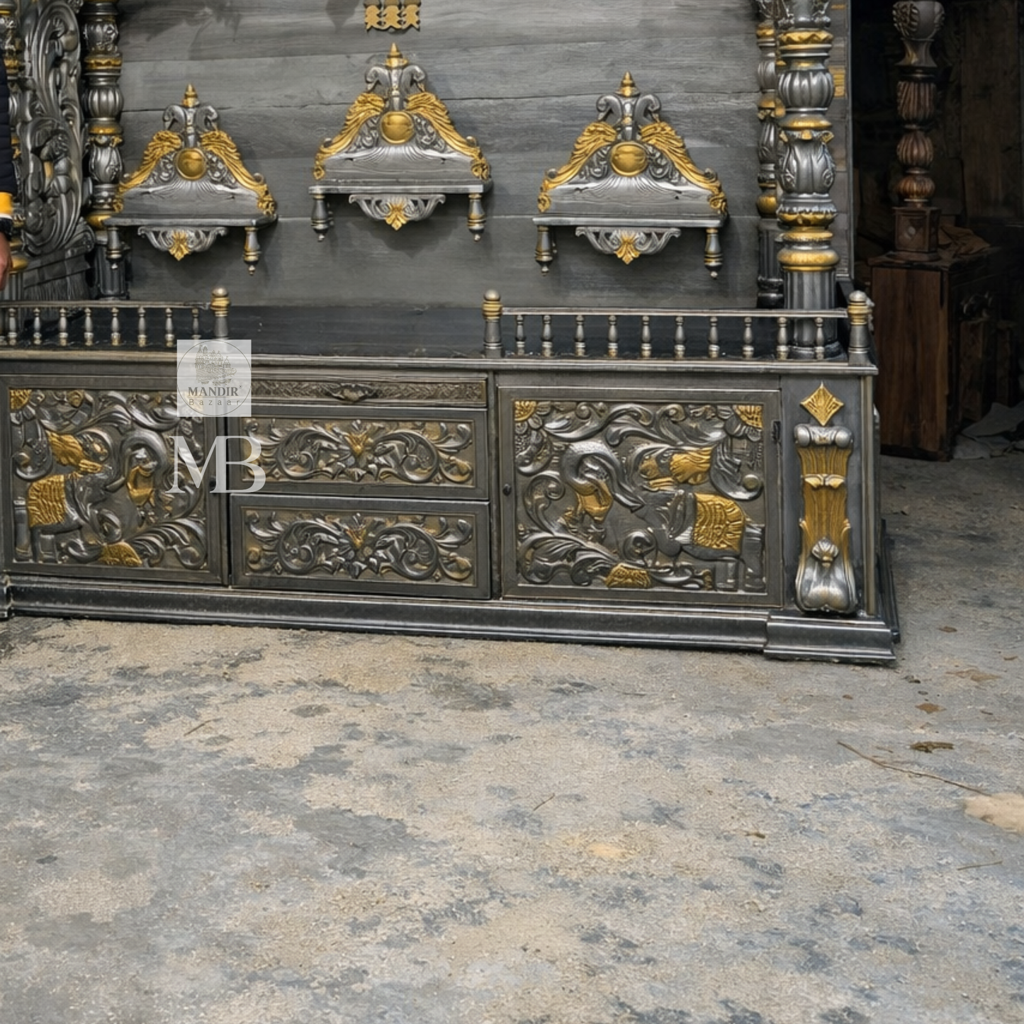 Luxury silver and gold hand carved wooden pooja mandir with ornate crown, decorative pillars, storage drawers and matching side cabinets