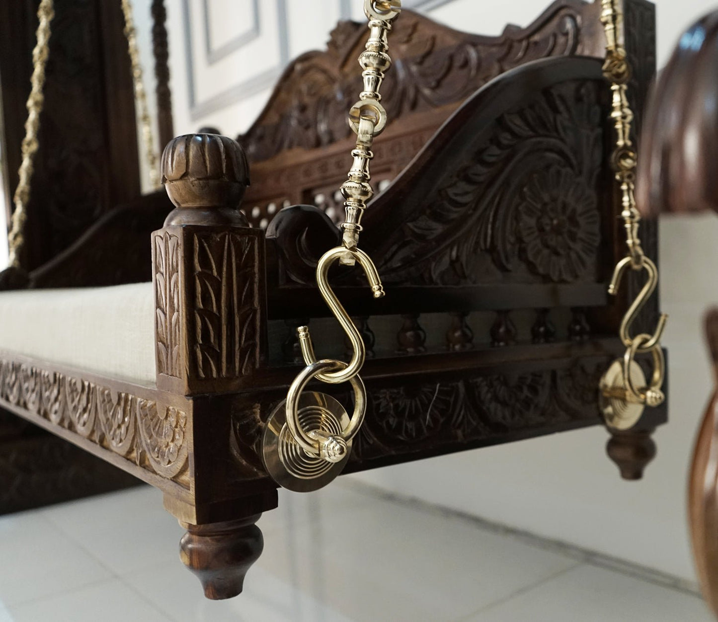 Classic wooden swing chair with supportive backrest and armrests