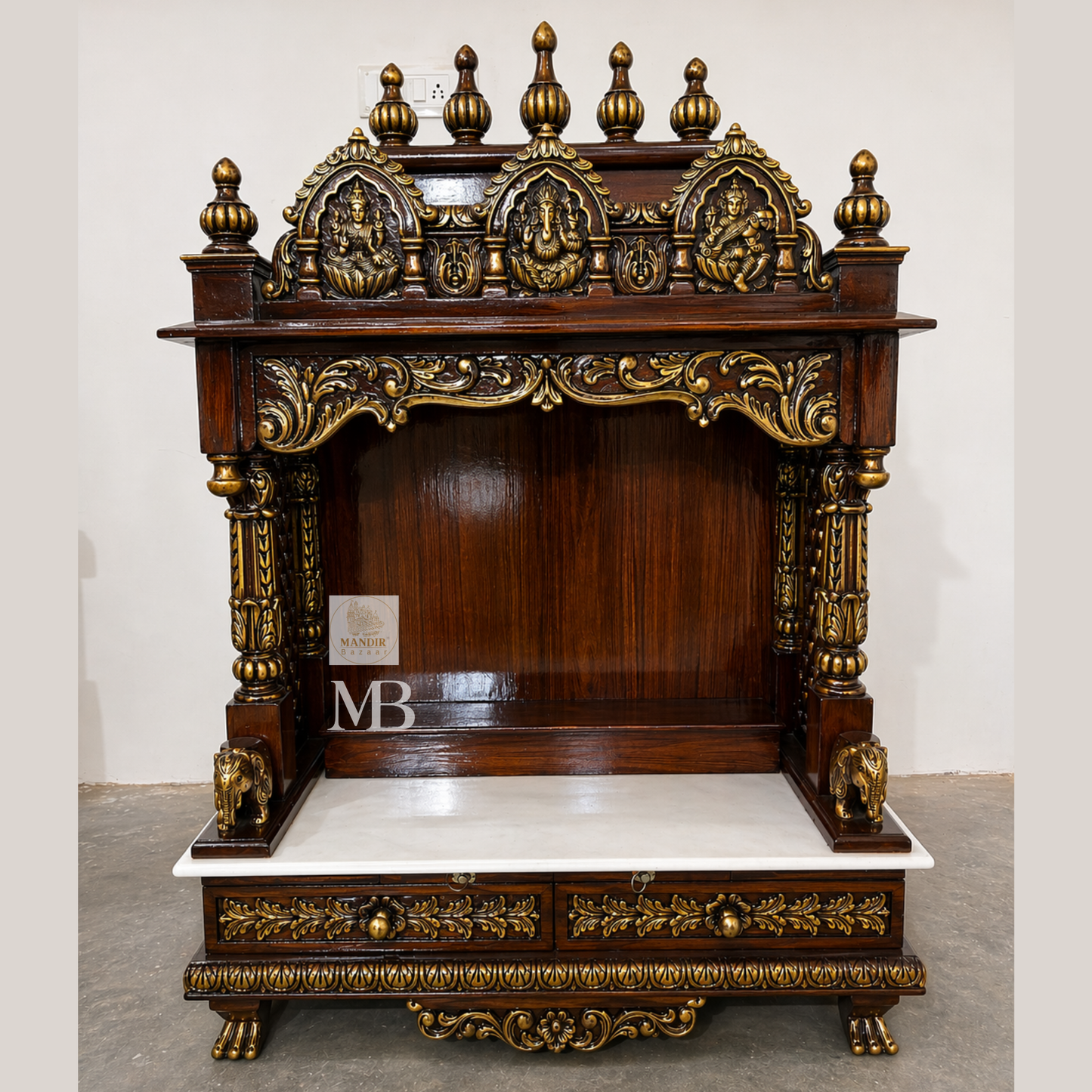 teak wood pooja mandir with hand carved details and storage drawers