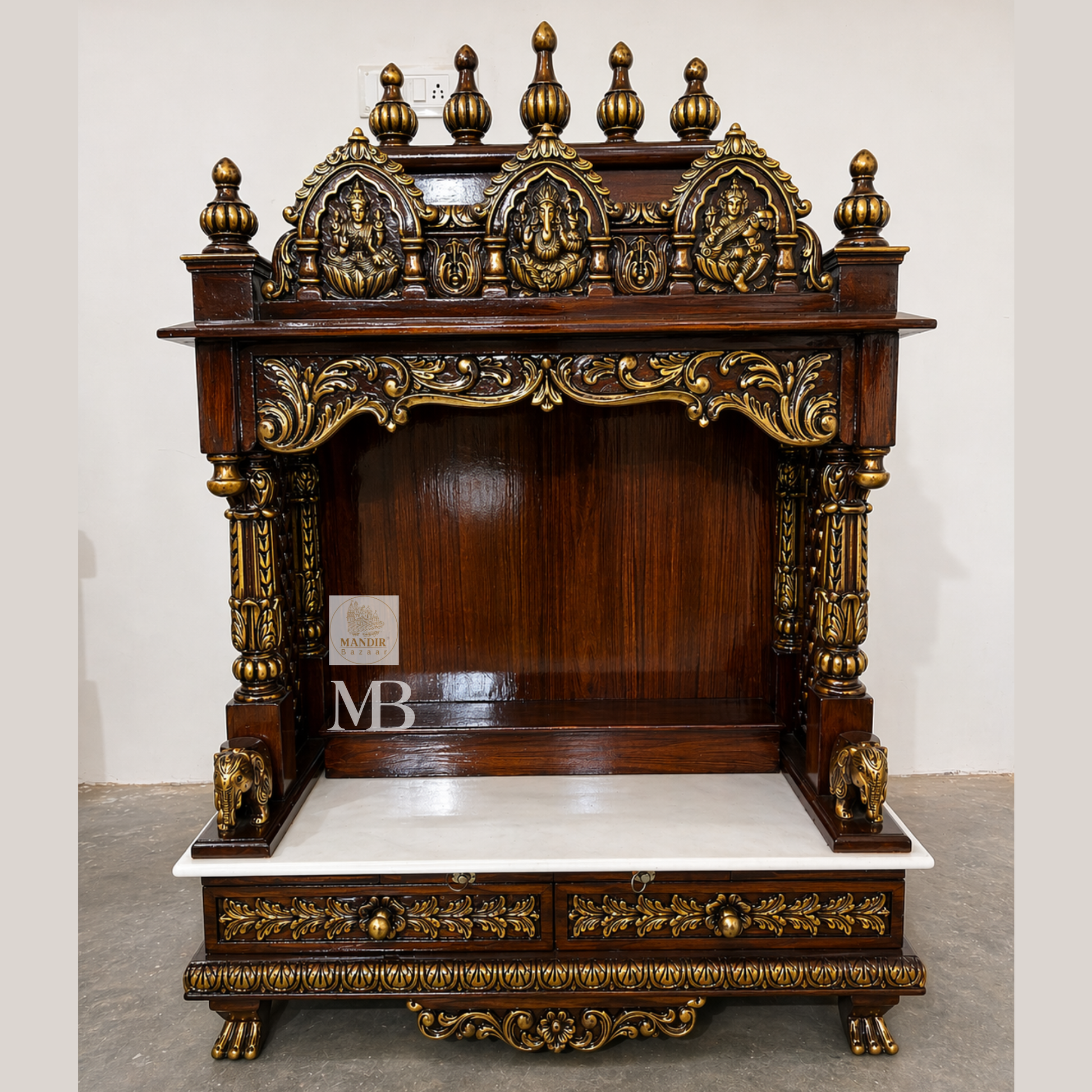 teak wood pooja mandir with hand carved details and storage drawers