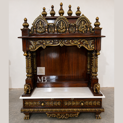 teak wood pooja mandir with hand carved details and storage drawers