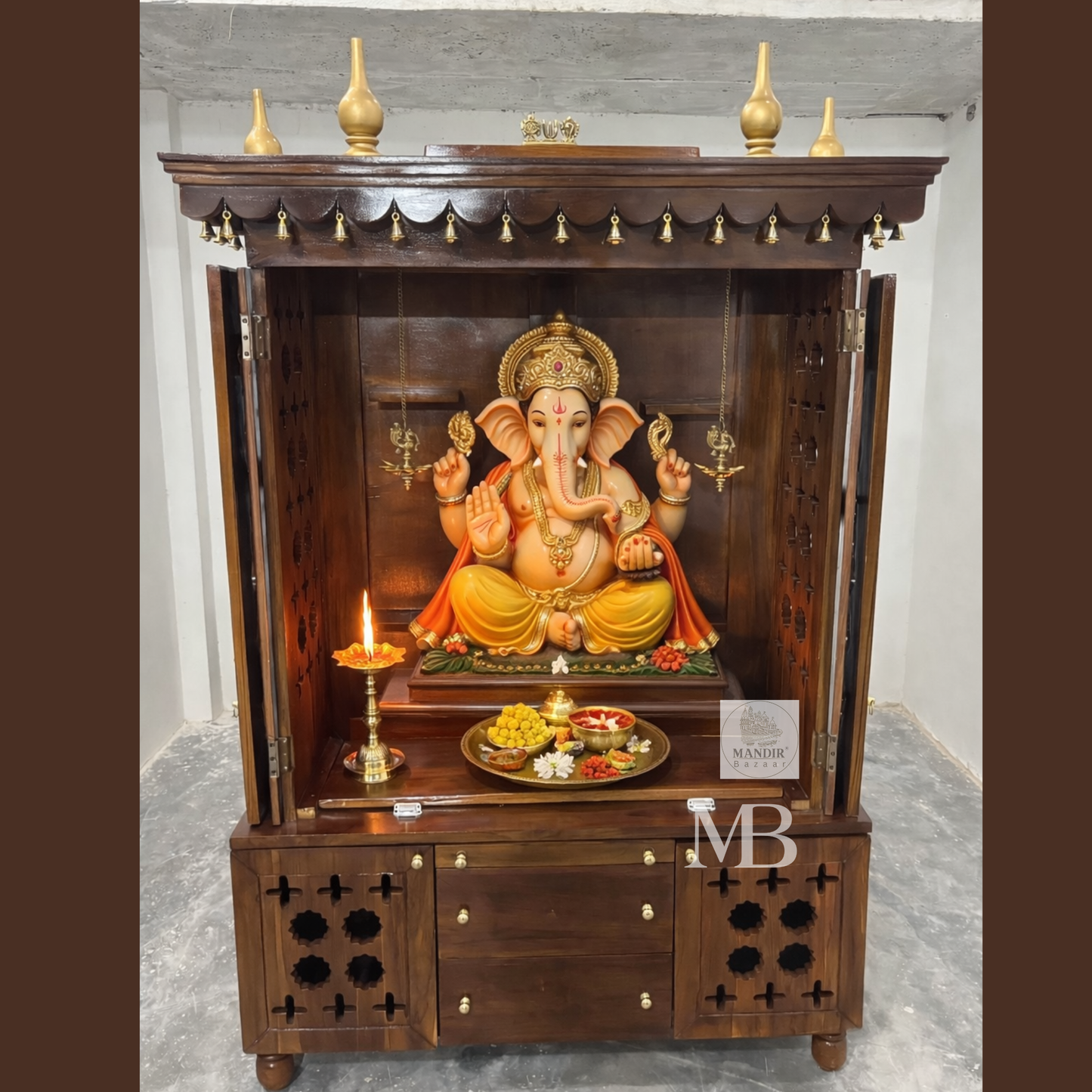 Handcrafted teak wood pooja mandir with storage cabinet, drawers, shelves and traditional brass bells