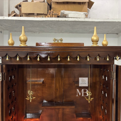 Handcrafted teak wood pooja mandir with storage cabinet, drawers, shelves and traditional brass bells
