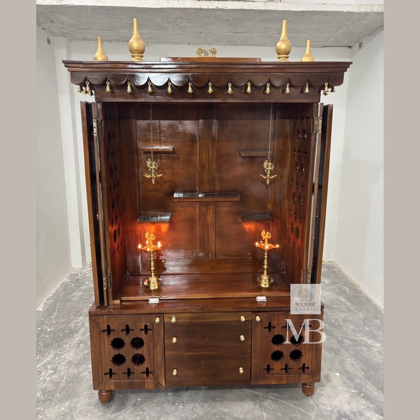 Handcrafted teak wood pooja mandir with storage cabinet, drawers, shelves and traditional brass bells