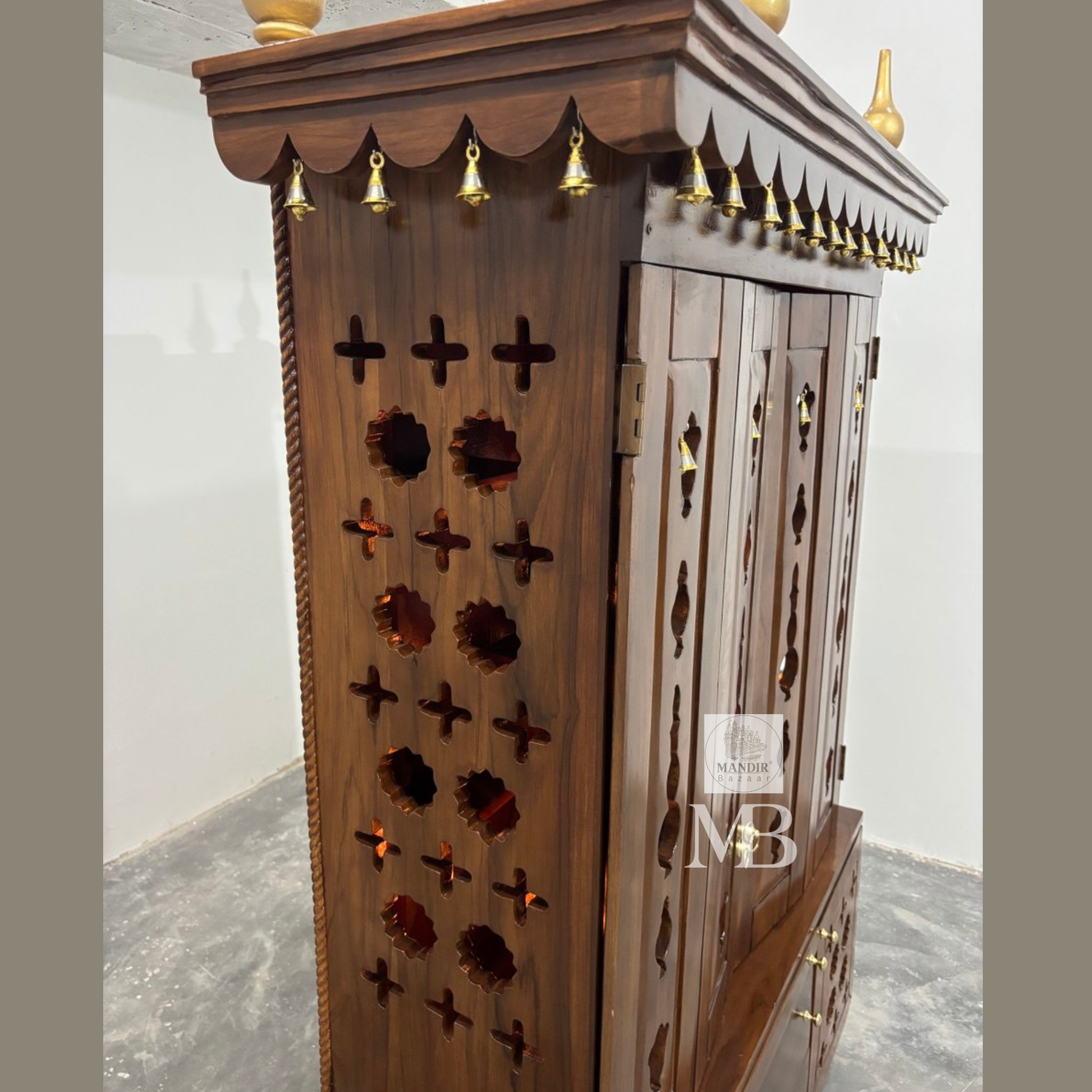 Handcrafted teak wood pooja mandir with storage cabinet, drawers, shelves and traditional brass bells