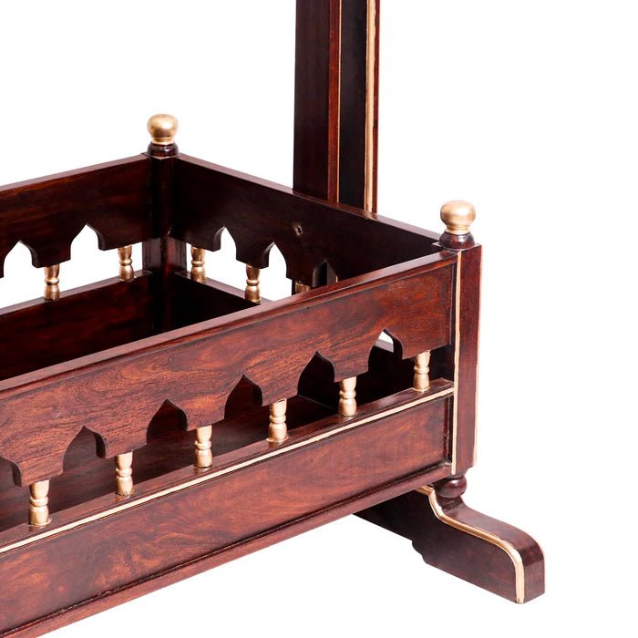 Classic acacia wood cradle for a natural nursery interior