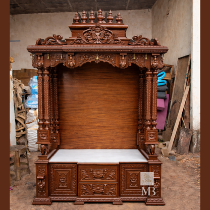 Traditional carved wooden mandir with decorative temple crown