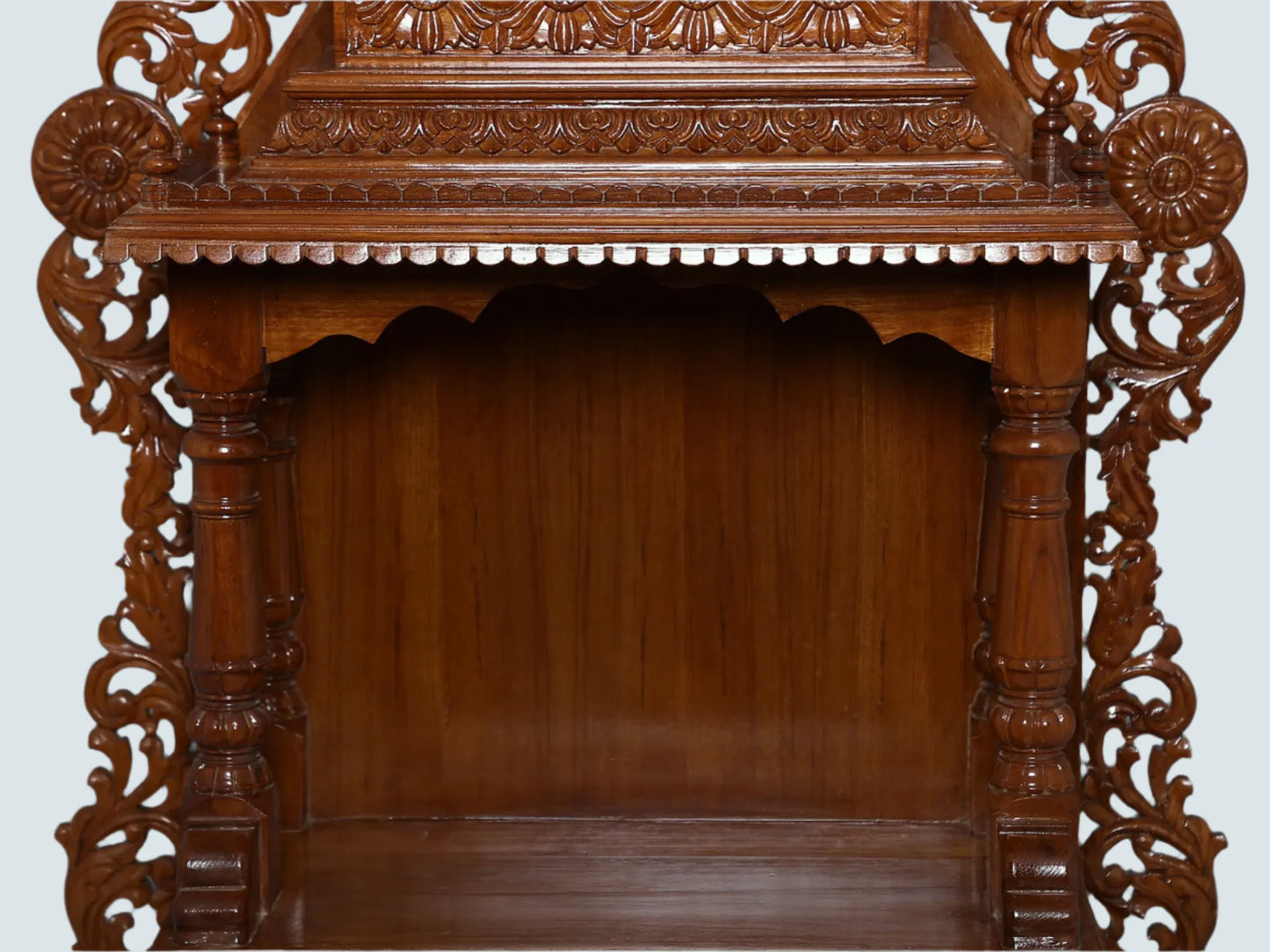 Traditional teakwood mandir for home prayer space