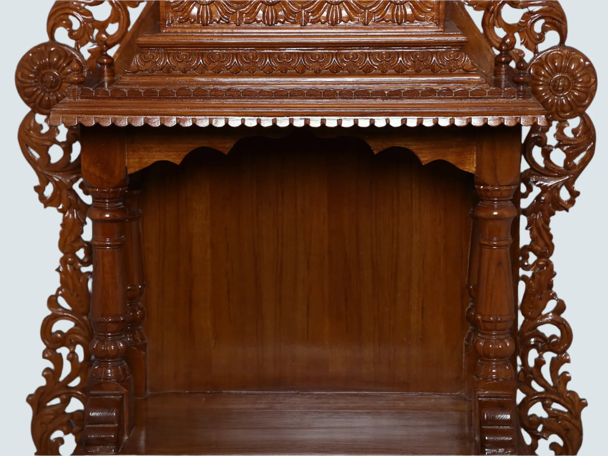 Traditional teakwood mandir for home prayer space