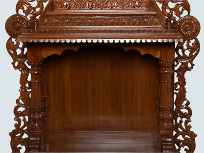 Traditional teakwood mandir for home prayer space