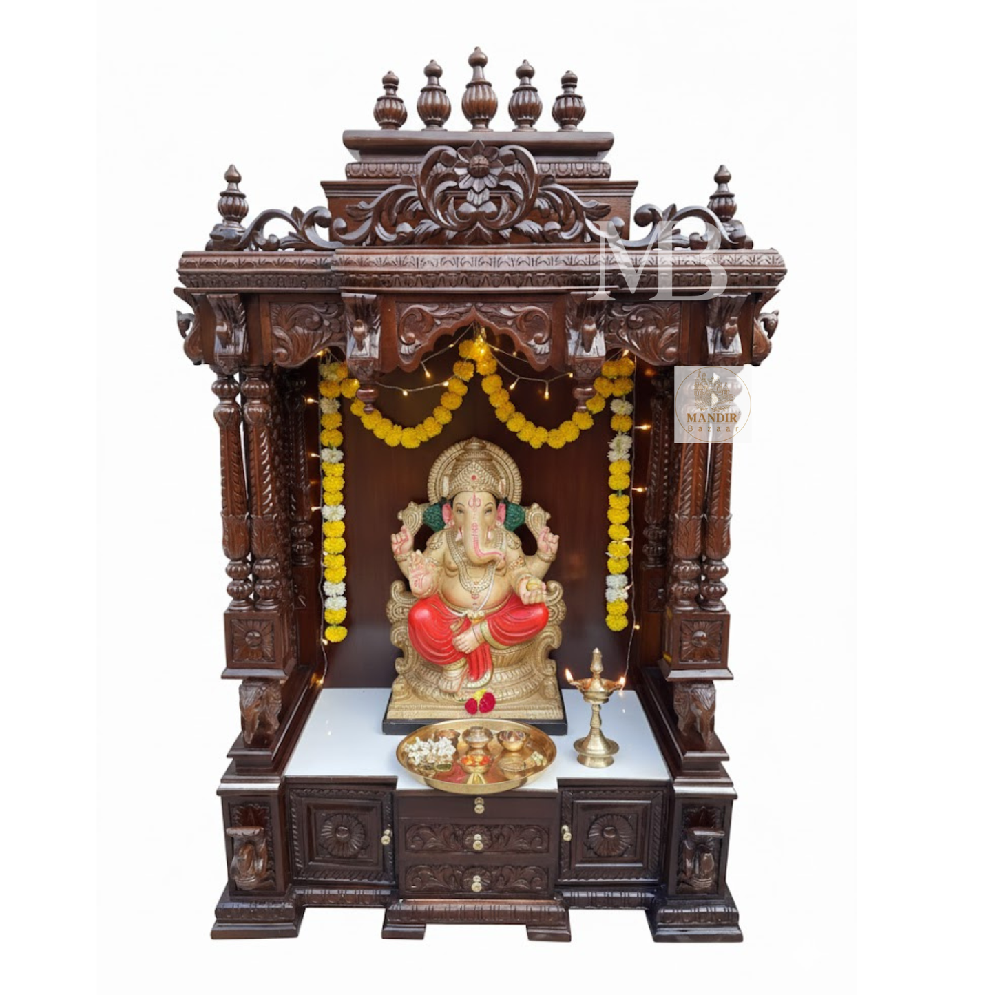 Traditional dark brown wooden pooja mandir for home with carved temple design