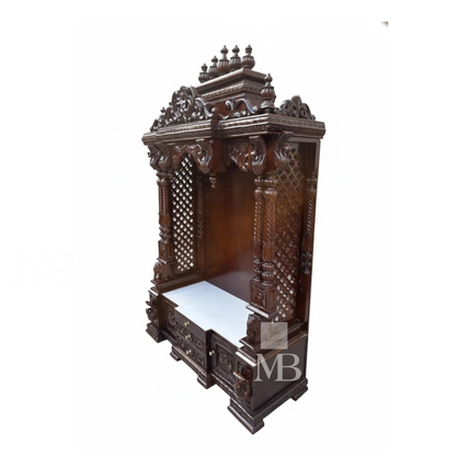 Ornate wooden Hindu temple with spacious prayer area for idols