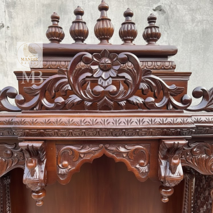 Traditional wooden temple with storage drawers for pooja accessories