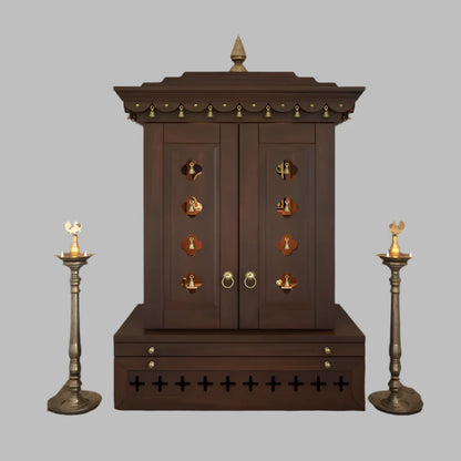 Traditional free standing wooden puja mandir with storage and brass bells