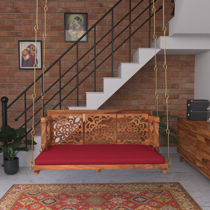 Vintage carved back red upholstered wooden swing