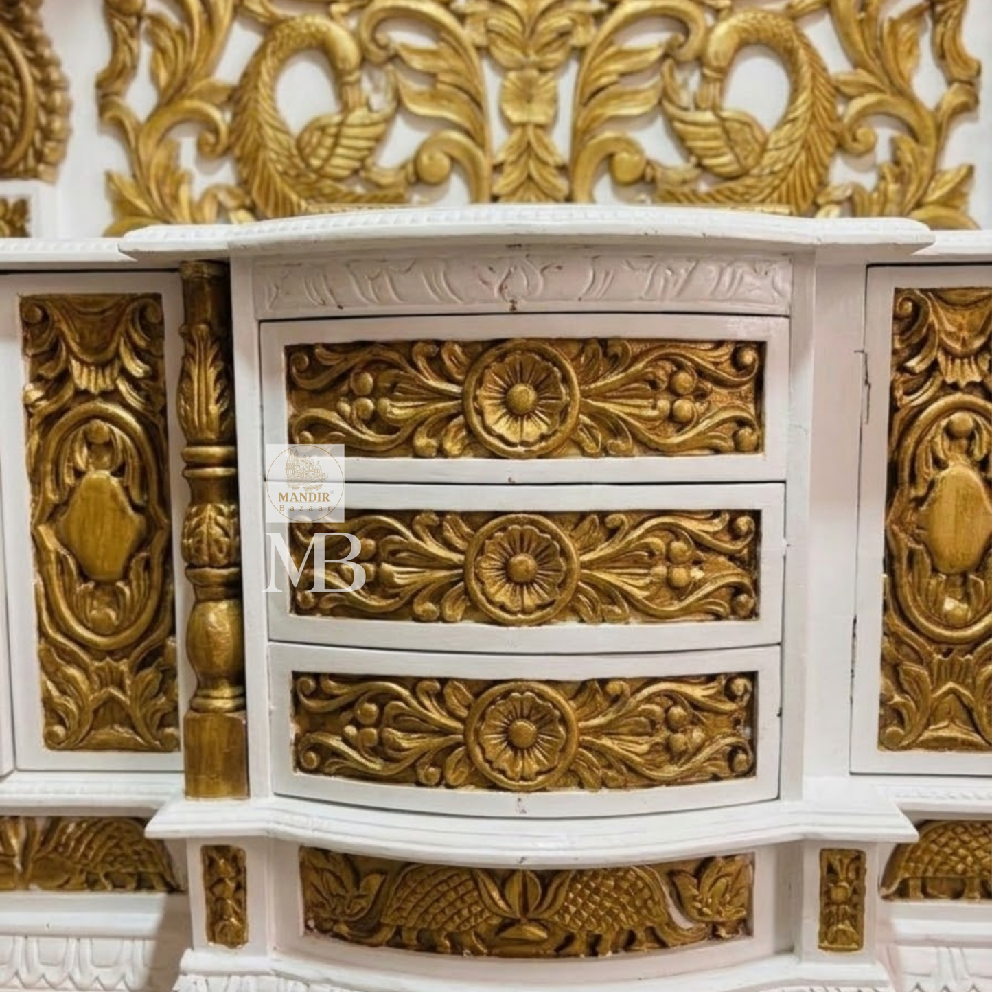 White and gold Hindu temple for home with decorative pillars and arches
