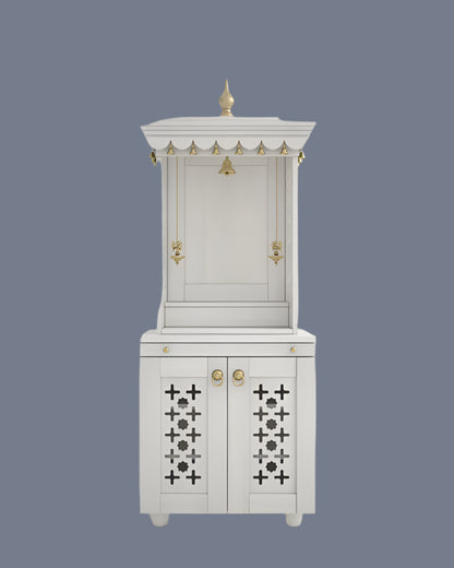 Traditional white wooden pooja mandir with brass hanging lamps