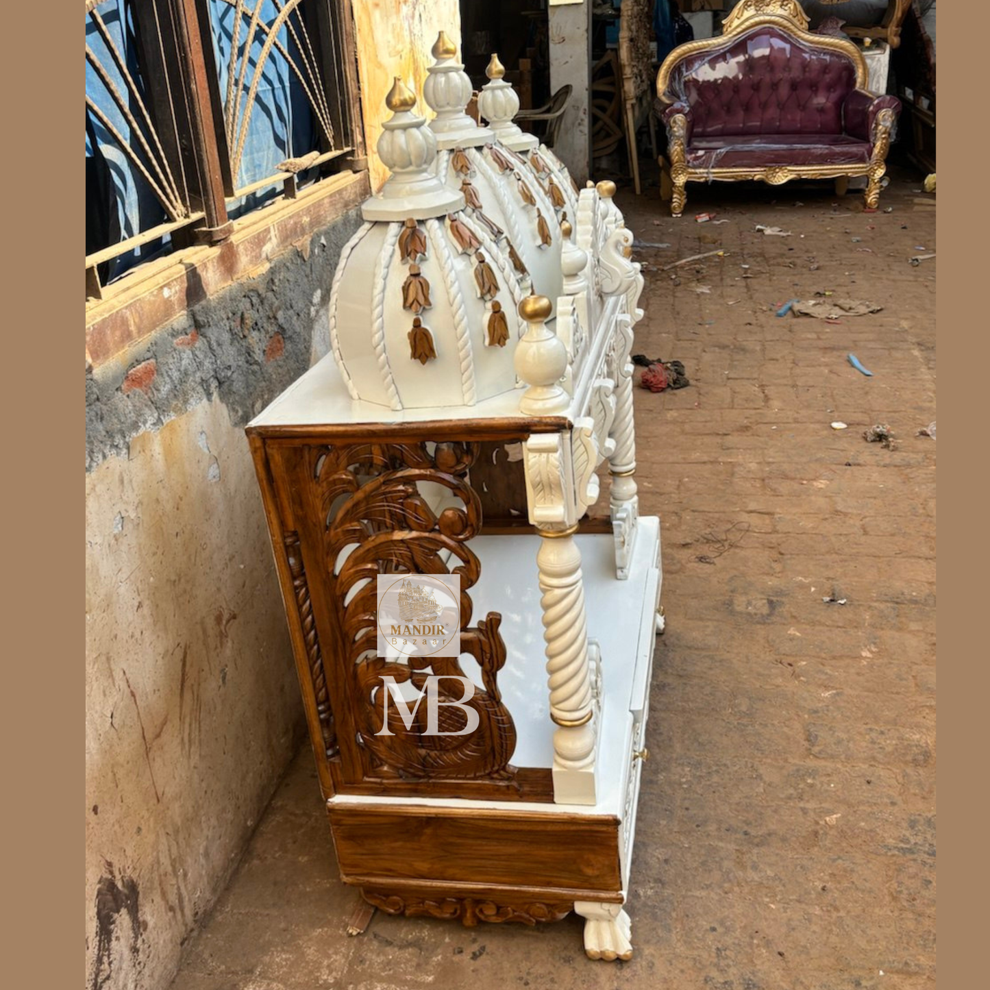 Handcrafted white wooden home temple with gold carved highlights and triple peacock domes