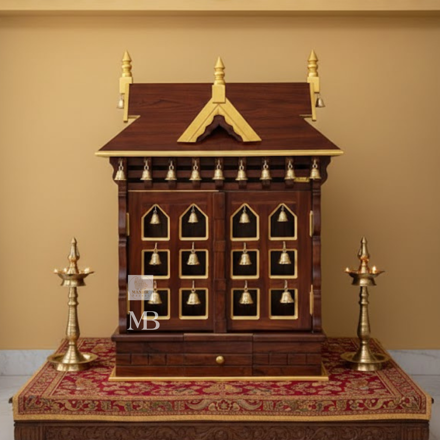 Front view of 3 feet tall Sheesham wood home temple with slanted gable roof and brass bell doors