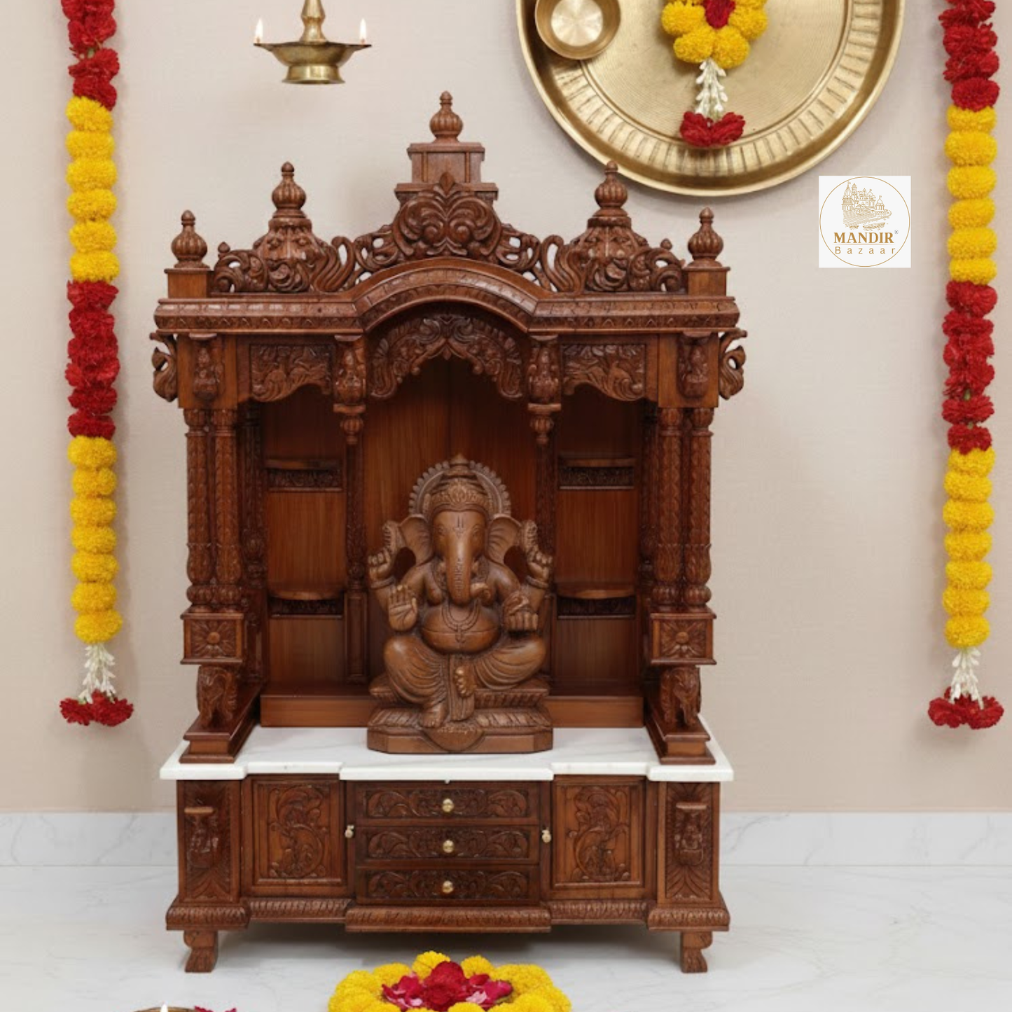 Hand carved wooden mandir for home with Ganesha design, ornate crown, decorative pillars and storage drawers