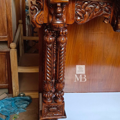 Hand carved wooden pooja mandir with traditional crown, Ganesha carving, ornate pillars, marble-look platform and storage drawers