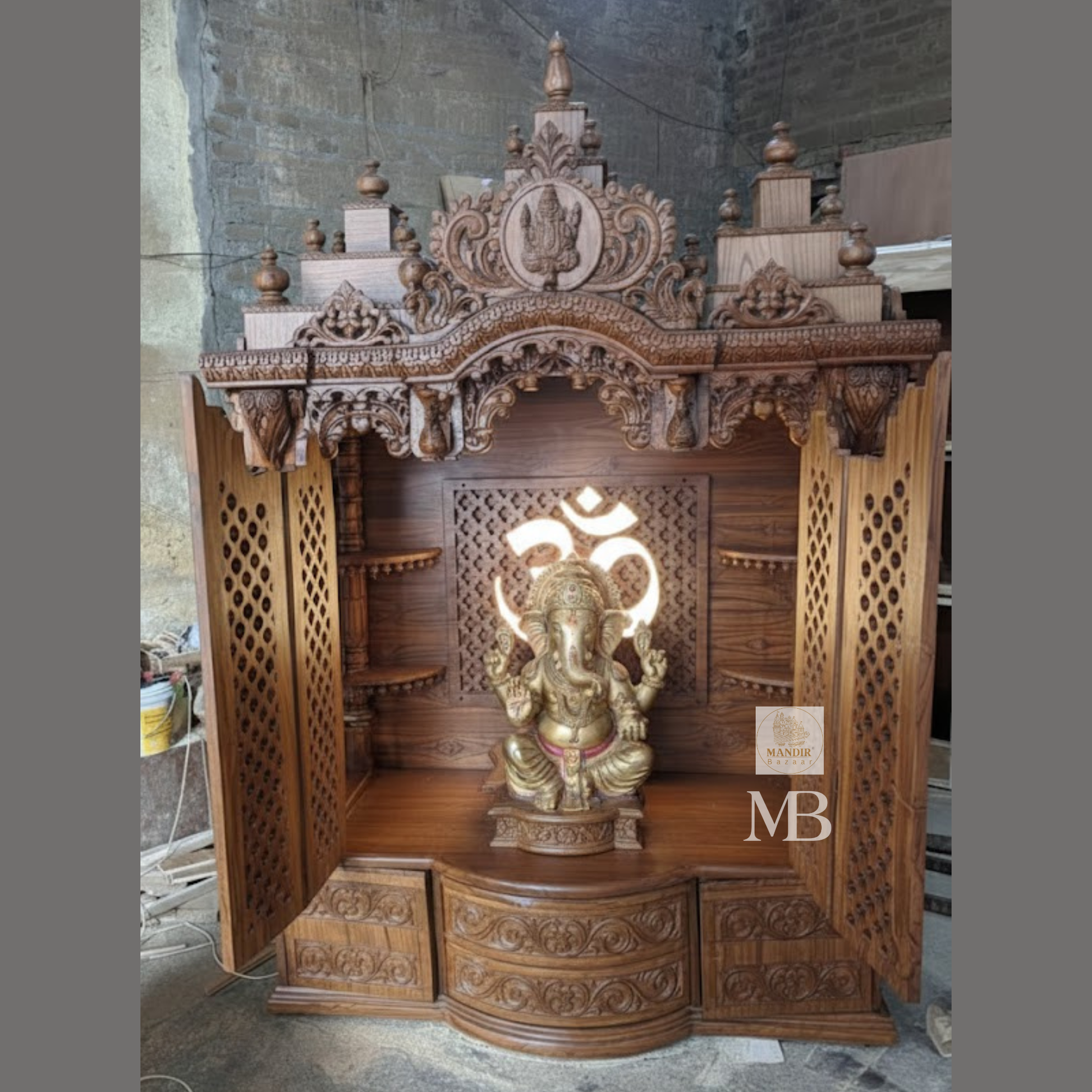 Luxury handcrafted wooden pooja mandir with illuminated OM LED back panel, side jali folding doors, solid teak wood, walnut brown finish, traditional Hindu temple for home by Mandir Bazaar.